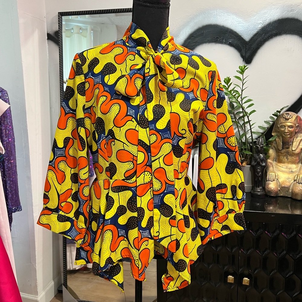 Ethnic/tribal peplum style top